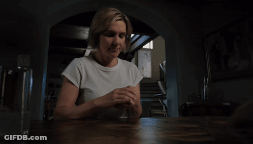 Man Taking Picture Of Woman In Red Robe GIF