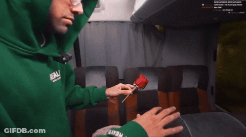 Man Taking Picture Of Woman With Phone GIF