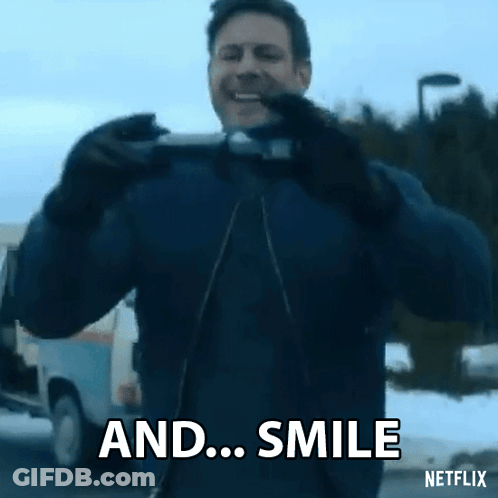 Man Taking Picture Saying And Smile GIF