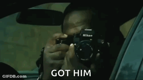 Man Taking Picture With Camera In Car GIF