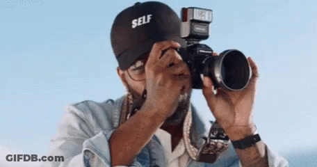 Man Taking Picture With Self Hat GIF