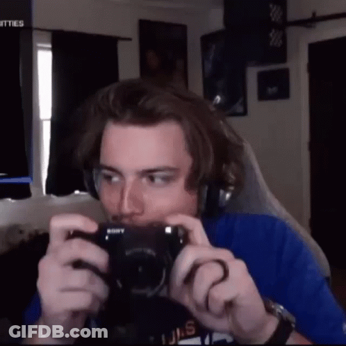 Man Taking Picture With Sony Camera GIF