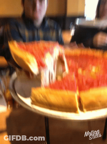 Man Taking Pizza From Motion Stills Plate GIF