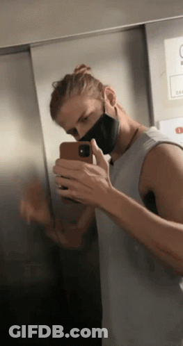 Man Taking Selfie In Elevator GIF