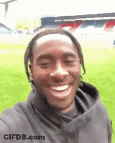 Man Taking Selfie In Front Of Soccer Field GIF
