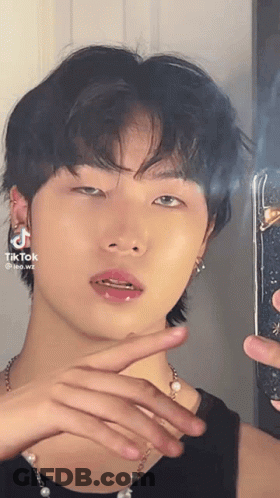 Man Taking Selfie In Mirror Wearing Pearl Necklace GIF