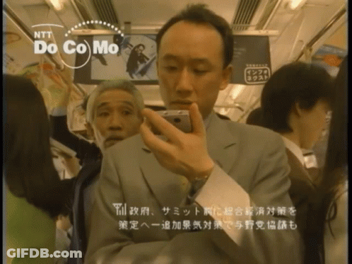 Man Taking Selfie On Bus With NTT Docomo GIF