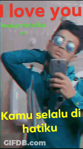 Man Taking Selfie Saying I Love You GIF