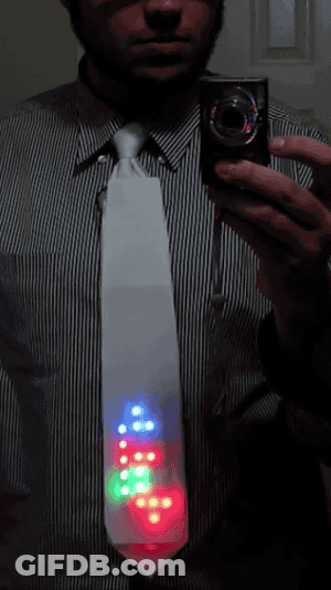 Man Taking Selfie With Christmas Tree Tie GIF