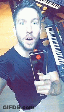 Man Taking Selfie With Piano GIF