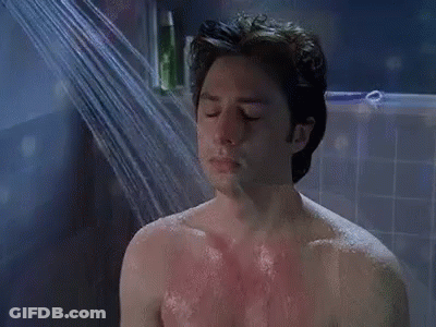 Man Taking Shower With Eyes Closed GIF