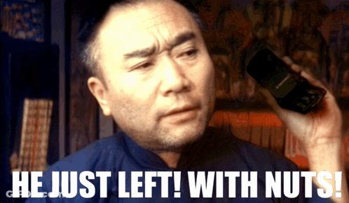 Man Talking Cell Phone He Just Left With Nuts GIF