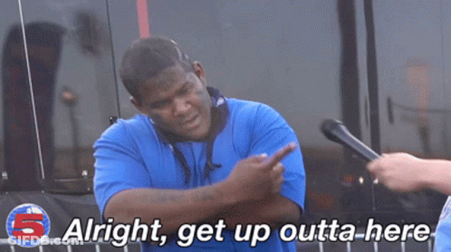 Man Talking Into Microphone Alright Get Up Outta Here GIF