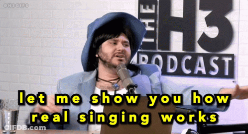 Man Talking Into Microphone At H3 Podcast Sign GIF