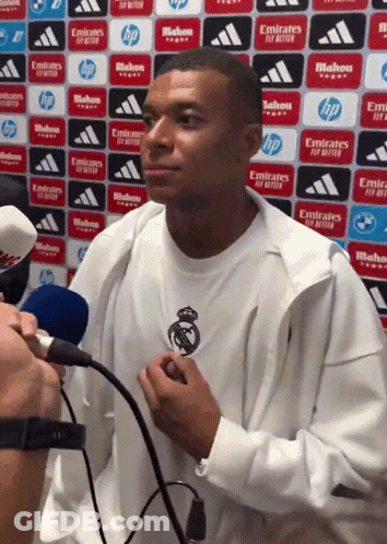 Man Talking Into Microphone Emirates Fly Better GIF