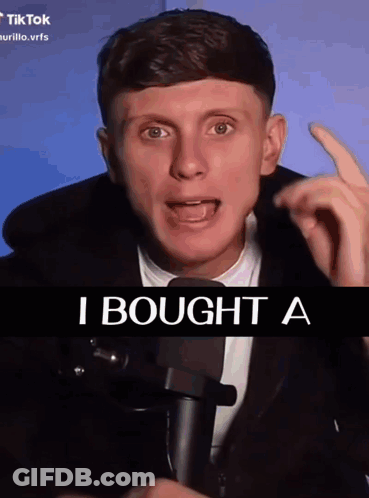 Man Talking Into Microphone Saying I Bought A GIF