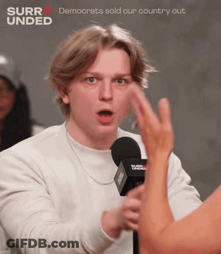 Man Talking Into Microphone Saying Surrounded GIF