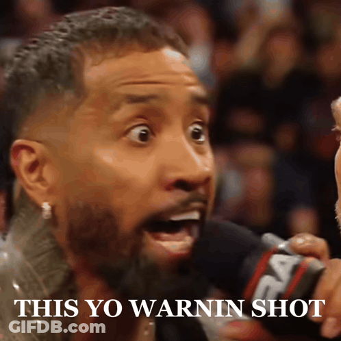 Man Talking Into Microphone Saying This Yo Warnin Shot GIF