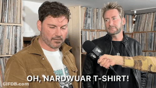 Man Talking Into Microphone With Oh Nardwuar T-Shirt GIF