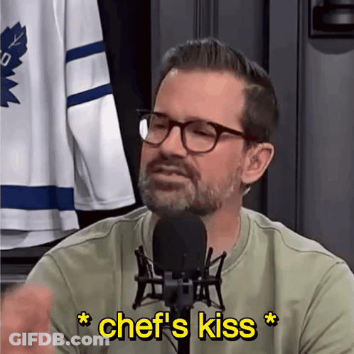 Man Talking Into Microphone With Yellow Chef's Kiss GIF