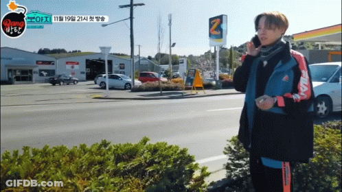 Man Talking On Cell Phone At Gas Station 2 GIF