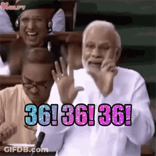 Man Talking On Cell Phone At Microphone Another Laughs GIF