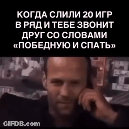 Man Talking On Cell Phone In Black Background GIF