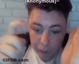 Man Talking On Cell Phone In White Shirt GIF