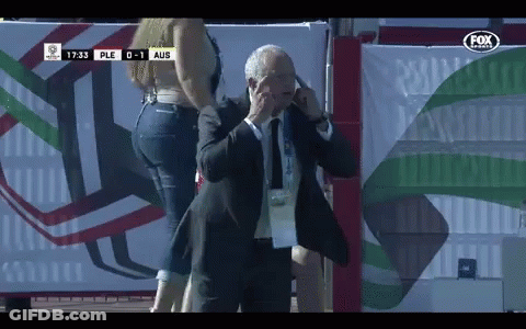 Man Talking On Cell Phone Near Sign Ple 0-1 Aus GIF