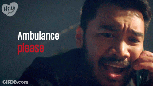 Man Talking On Cell Phone Saying Ambulance Please GIF