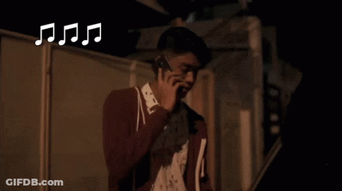 Man Talking On Cell Phone Saying Good Luck Brucie GIF