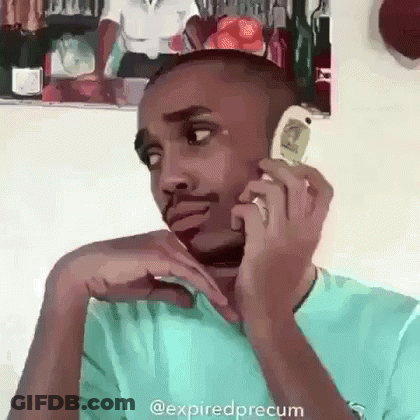Man Talking On Cell Phone Sitting In Chair GIF