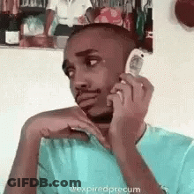 Man Talking On Cell Phone Sitting In Chair GIF