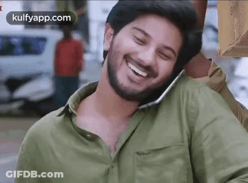 Man Talking On Cell Phone Smiling GIF