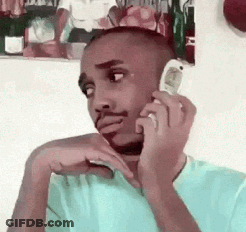 Man Talking On Cell Phone While Sitting GIF