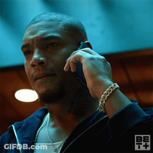 Man Talking On Cell Phone With Bet+ Logo GIF