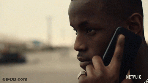 Man Talking On Cell Phone With Netflix GIF