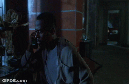 Man Talking On Phone In Dark GIF