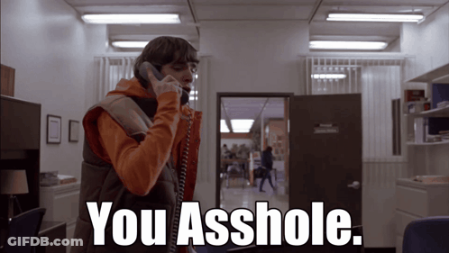 Man Talking On Phone Saying You Asshole GIF