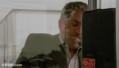 Man Talking On Phone With 24 Hour Emergency Button GIF