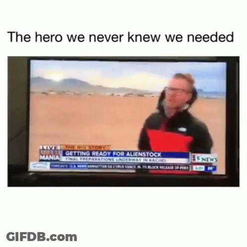 Man Talking On Television Holding Red Pillow GIF