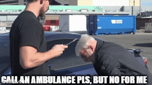 Man Talking To Another Man Call An Ambulance Pls GIF