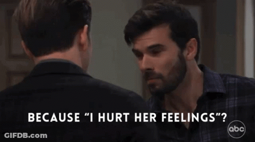Man Talking To Another Man Saying Because I Hurt Her Feelings GIF