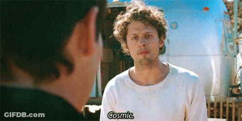 Man Talking To Another Man With Cosmic Shirt GIF