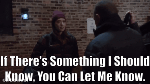 Man Talking To Woman About Knowing GIF
