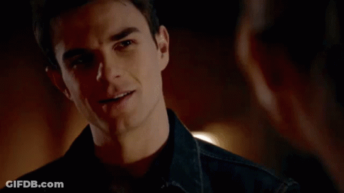 Man Talking To Woman In Dark Room GIF