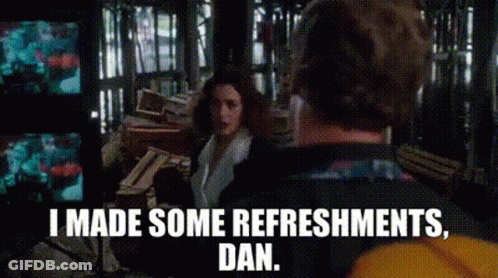 Man Talking To Woman In Dark Room Says I Made Some Refreshments Dan GIF
