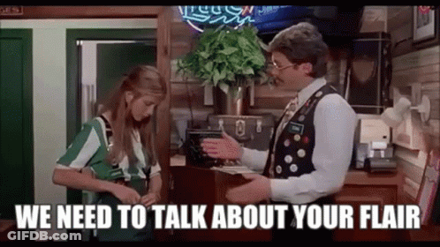 Man Talking To Woman In Room GIF