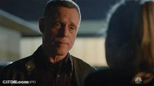 Man Talking To Woman With #Chicagopd GIF