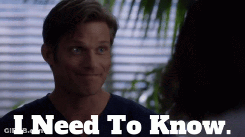 Man Talking To Woman With I Need To Know Below GIF
